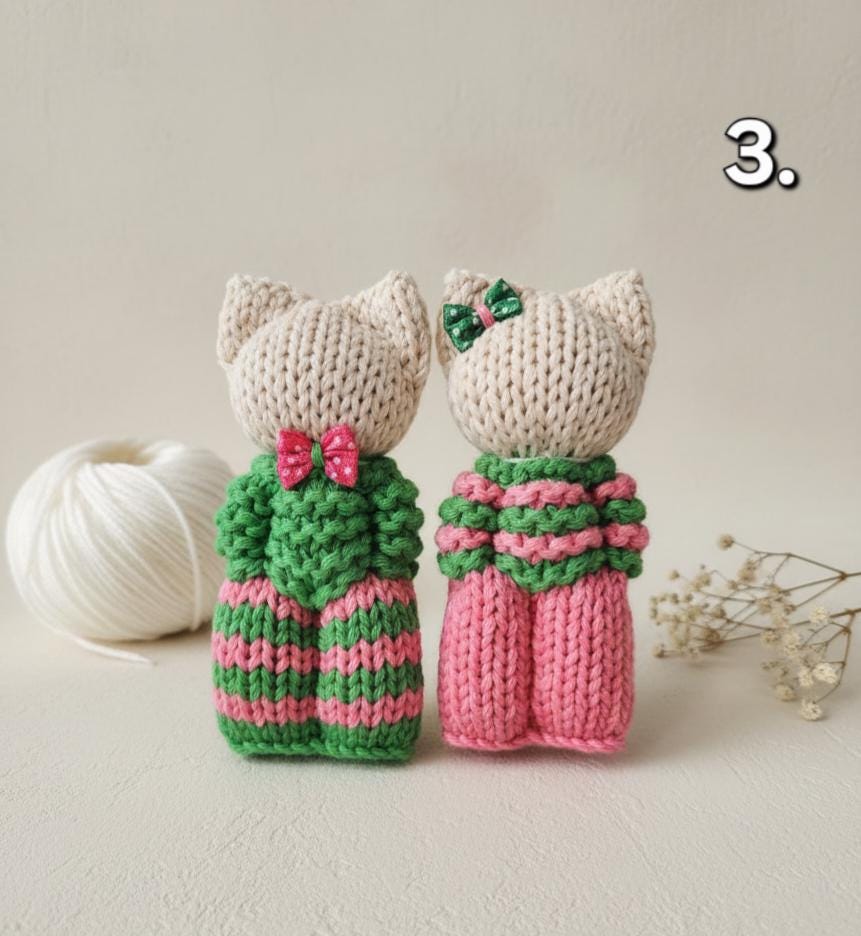 Couple de Doudous, chat ou bonhomme.
